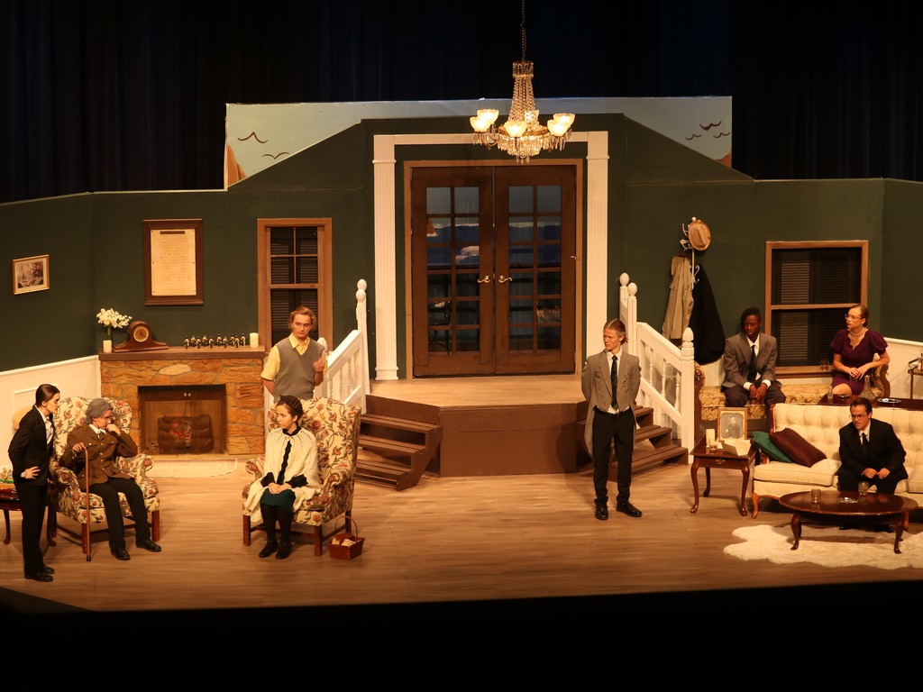 Scene: a 20th century parlor with fire place and French Doors. FZW cast at final dress rehearsal