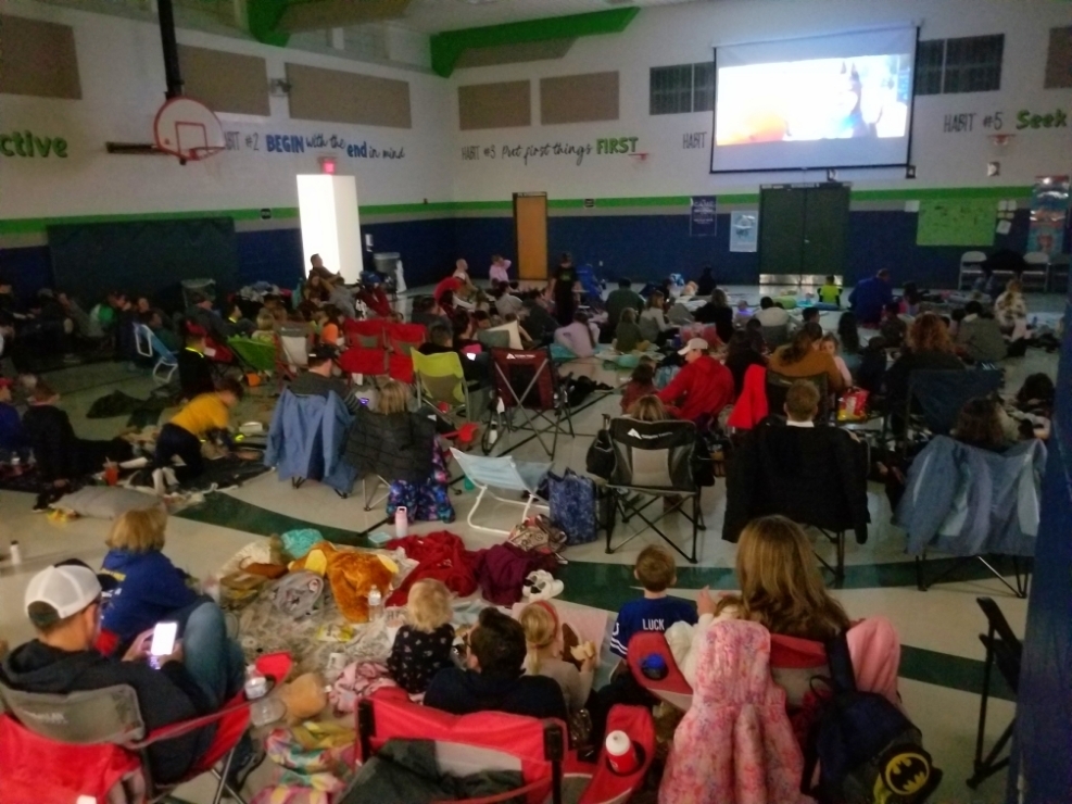 families watching movie at Ostmann Elementary