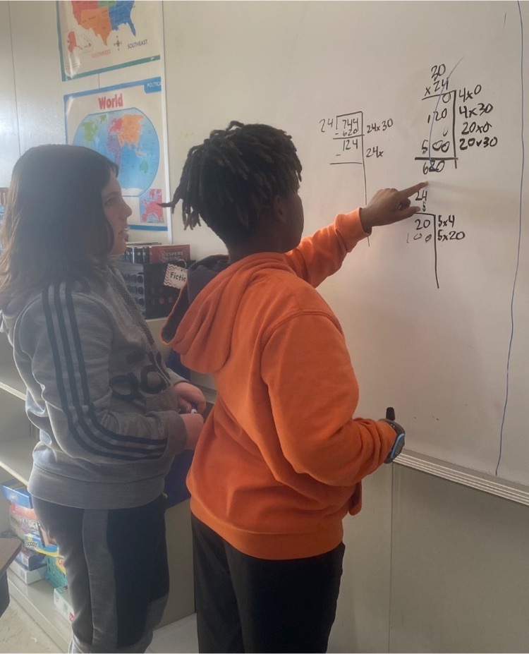 students solving math equations 