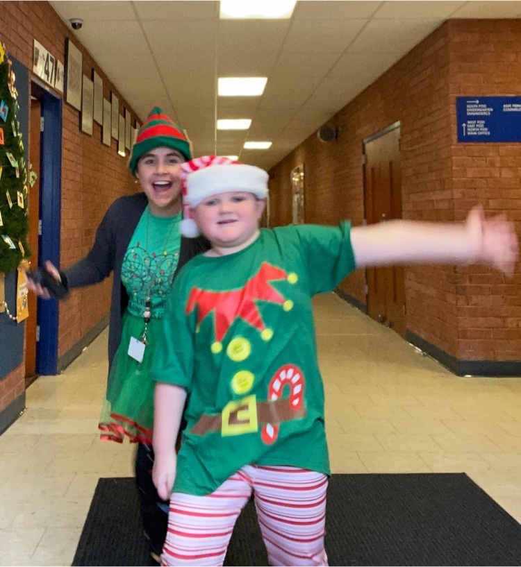 students and staff dress as elves 